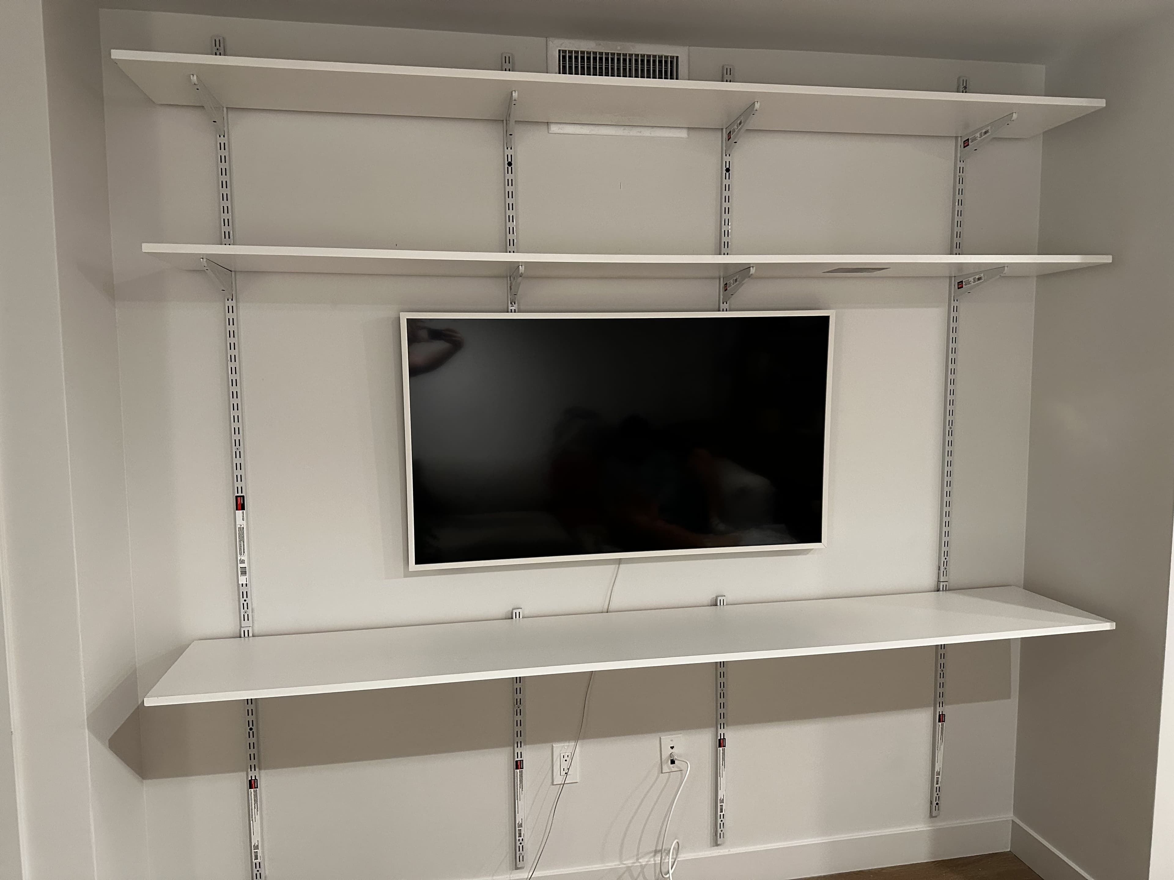 Wall shelving and storage installation