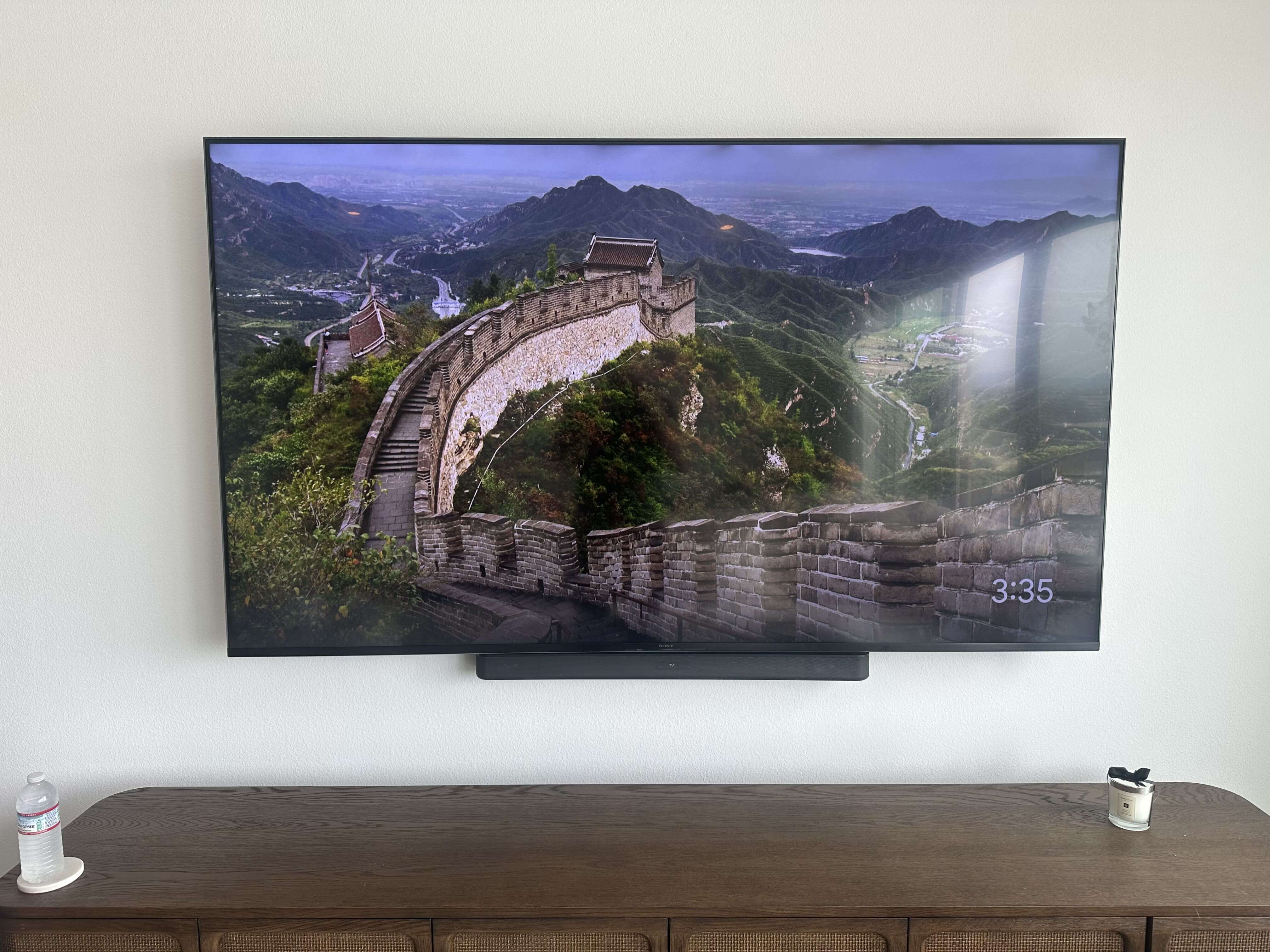 Wall-mounted TV with a clean entertainment setup