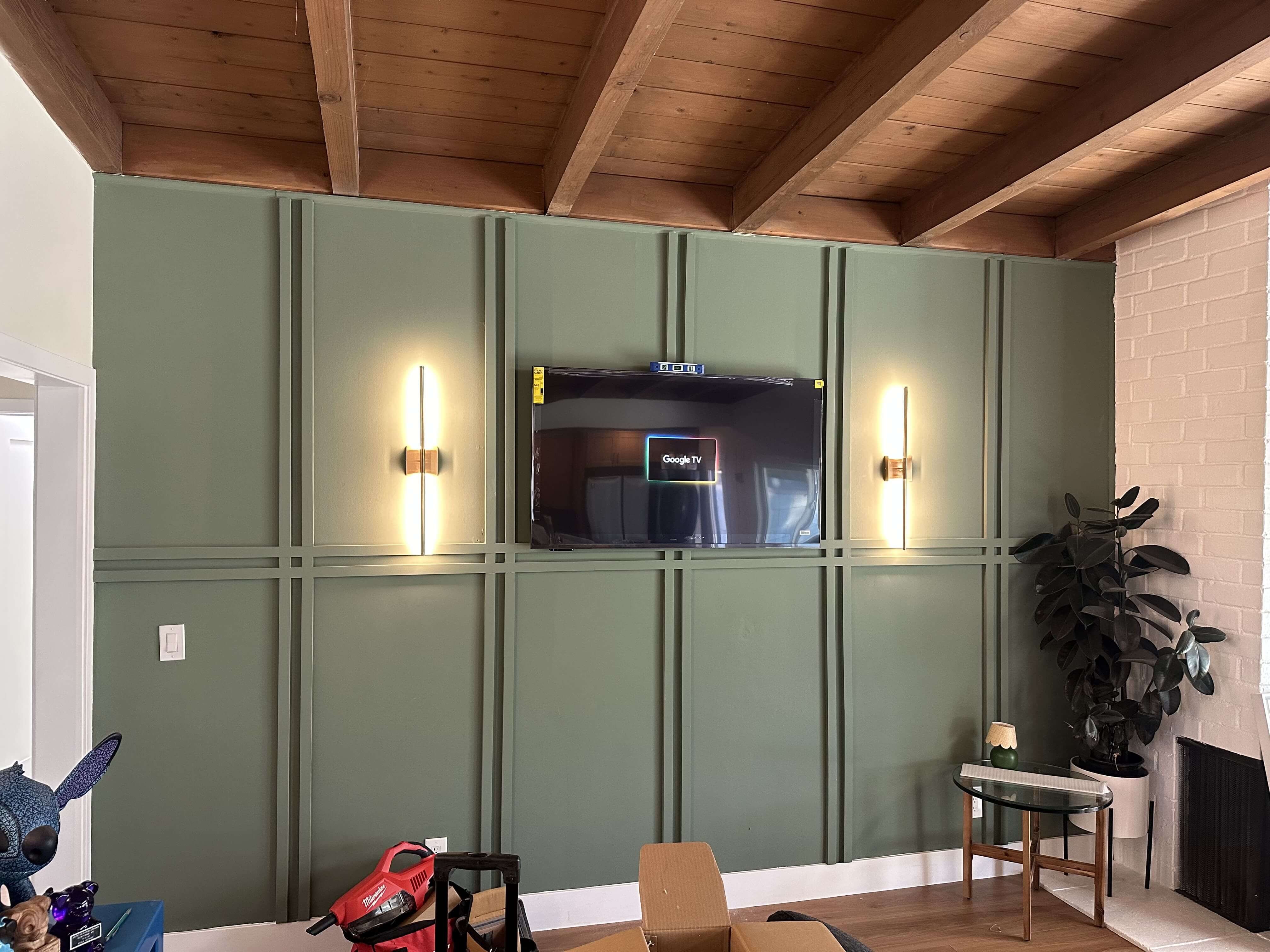 Wall-mounted TV with a clean entertainment setup