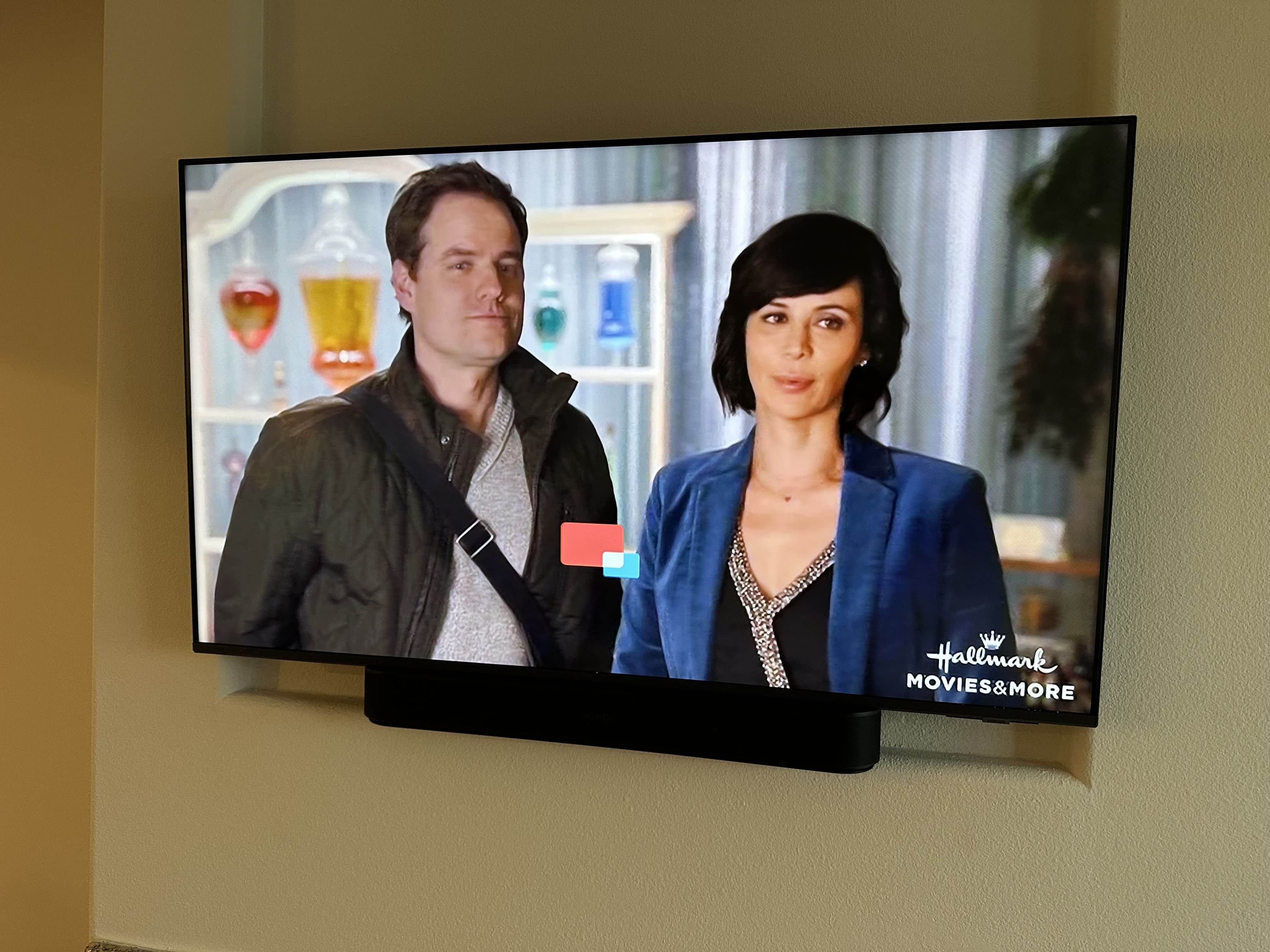 Wall-mounted TV with a clean entertainment setup
