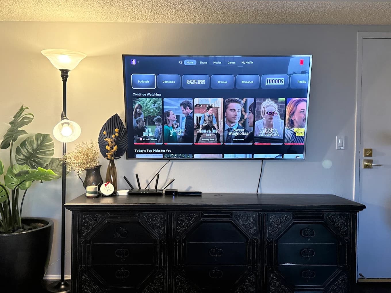 Wall-mounted TV with a clean entertainment setup